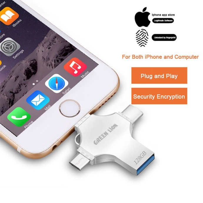 alt="Green Lion Silver USB flash drive 4 in 1 connected to an iPhone, showing the iPhone Apple brand and fingerprint logo. Labeled For Both iPhone and Computer. Orange tags written ,Plug and Play and Security Encryption"