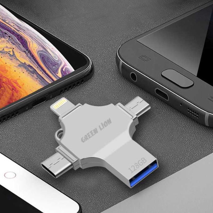 alt="USB Drive 4 in 1 by Green Lion brand on Table, ability to connect 3 devices"