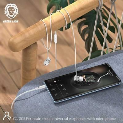 alt="A white Green Lion Metal Earphone , wrapped on the chair handle. A smartphone on the blue chair"
